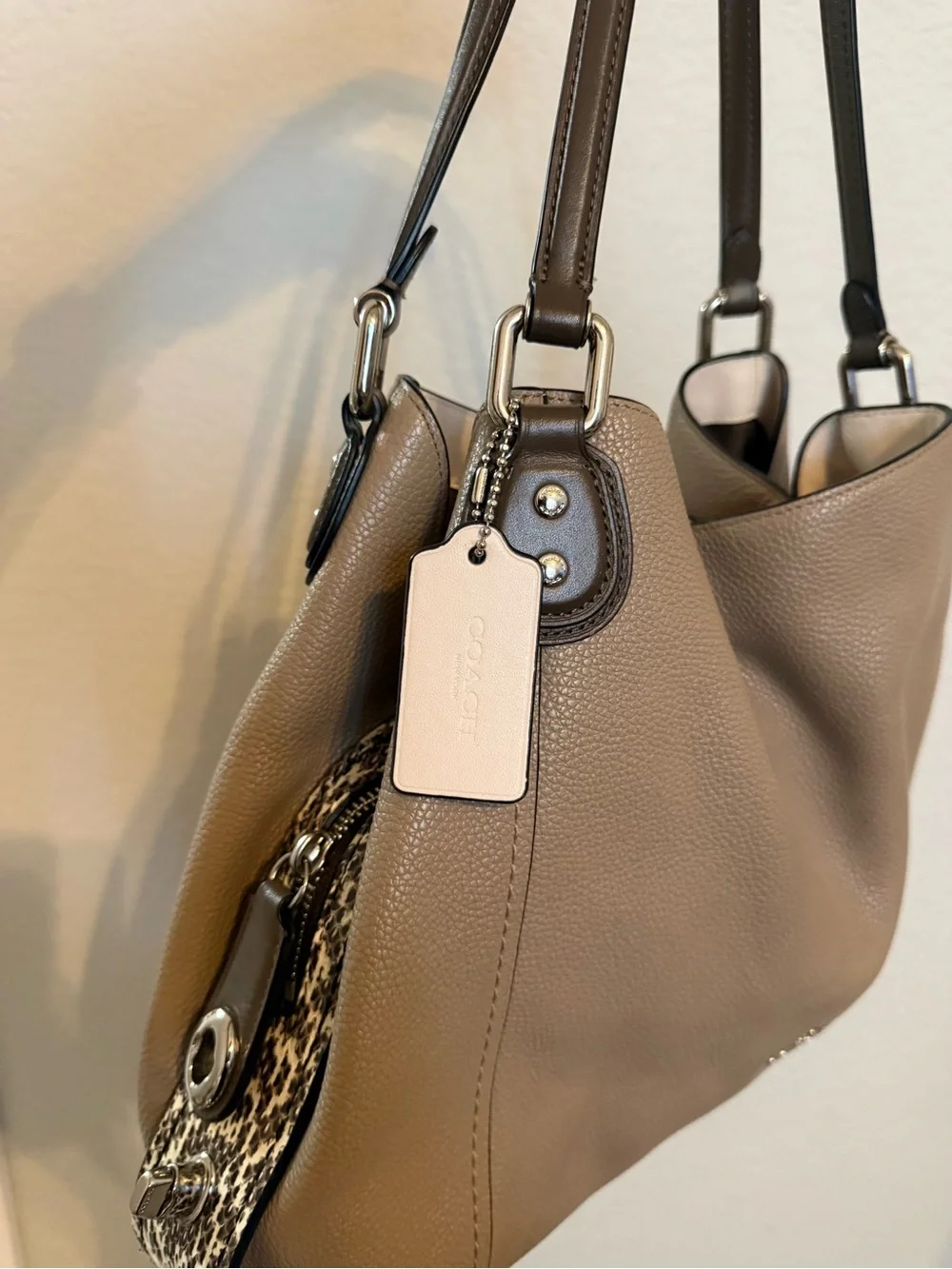 Coach sleek taupe